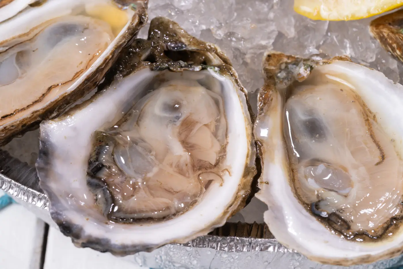 Chargrilled oyster kits with butter and seasoning