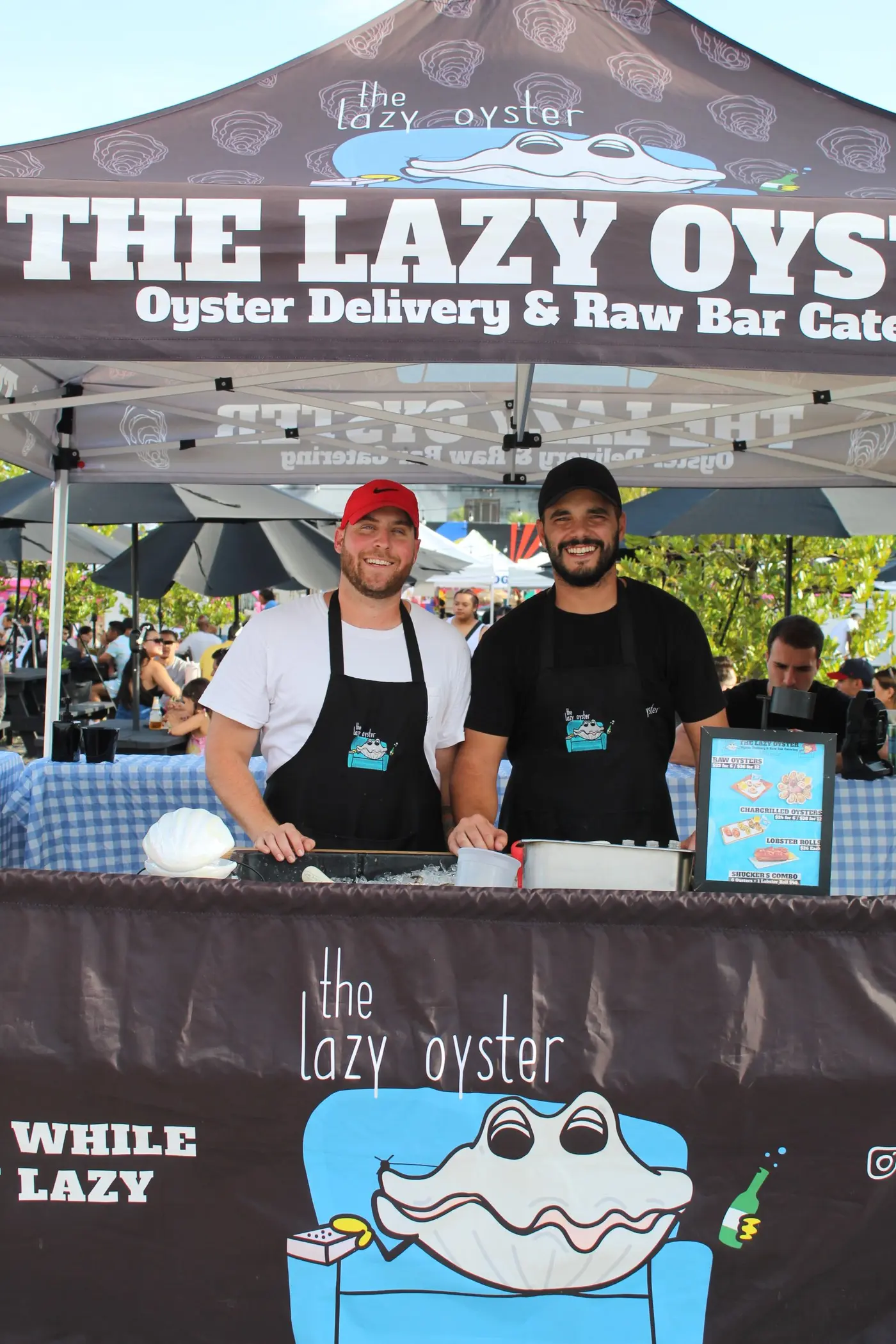 Fresh shucked oysters on ice with lemon and cocktail sauce – The Lazy Oyster Miami